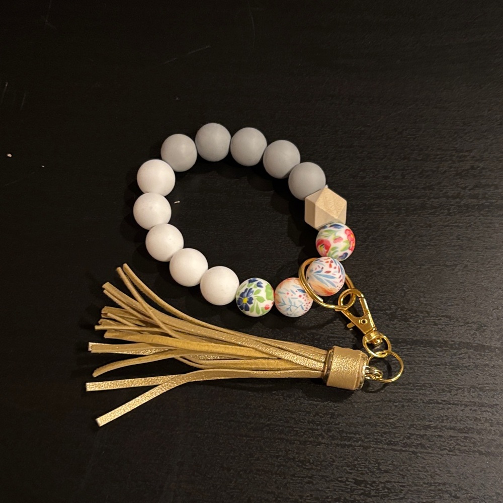 White and Gold Beaded Bracelet with Tassel